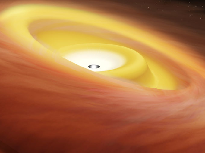 Artist's impression of a warped disk around a protostar. ALMA observed the protostar IRAS04368+2557 in the dark cloud L1527 and discovered that the protostar has a disk with two misaligned parts. Credit: RIKEN