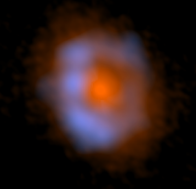 Imagen coloreada de V883 Ori generada por ALMA. La distribución del polvo se muestra en naranja, mientras que la distribución del metanol (una molécula orgánica) se muestra en azul. Créditos: ALMA (ESO/NAOJ/NRAO), Lee et al.