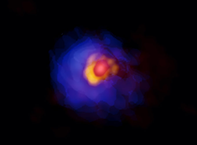 ALMA image of the massive protostar G353.273+0.641. Compact emission around the central protostar, disk, and gaseous envelope are shown in red, yellow, and blue. Asymmetry in the disk is clearly visible with the high-resolution ALMA observations. Credit: ALMA (ESO/NAOJ/NRAO), Motogi et al.