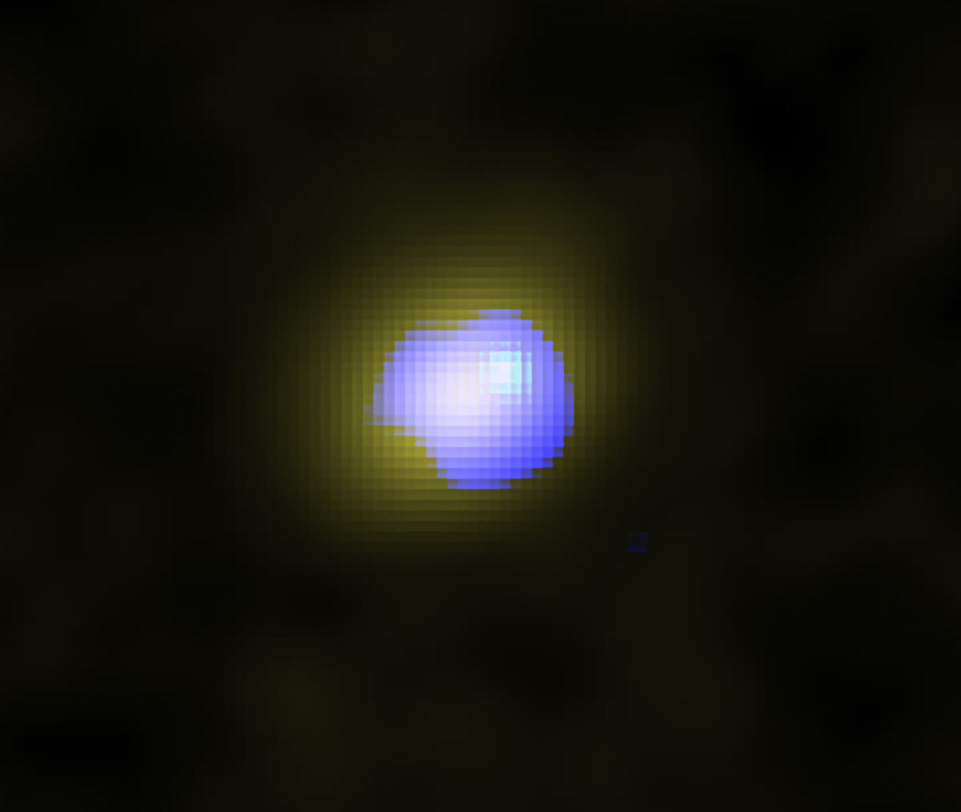 ALMA image of the distant galaxy J1243+0100 hosting a supermassive black hole in its center. The distribution of the quiet gas in the galaxy is shown in yellow, and the distribution of high-speed galactic wind is shown in blue. The wind is located in the galaxy center, which indicates the supermassive black hole drives the wind. Credit: ALMA (ESO/NAOJ/NRAO), Izumi et al.