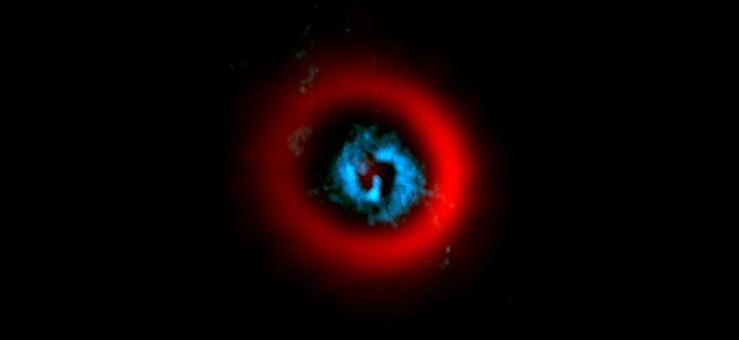 Astrónomos encuentran espirales dentro de un surco en el disco de polvo de una estrella en formación