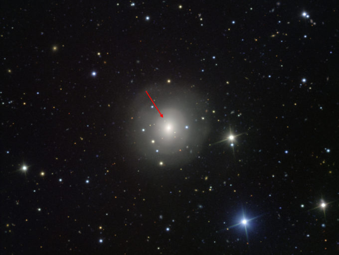 This image from the VIMOS instrument on ESO’s Very Large Telescope at the Paranal Observatory in Chile shows the galaxy NGC 4993, about 130 million light-years from Earth. The galaxy is not itself unusual, but it contains something never before witnessed, the aftermath of the explosion of a pair of merging neutron stars, a rare event called a kilonova (indicated with the arrow). This merger also produced gravitational waves and gamma rays, both of which were detected by LIGO–Virgo and Fermi/INTEGRAL respectively. Credit: ESO