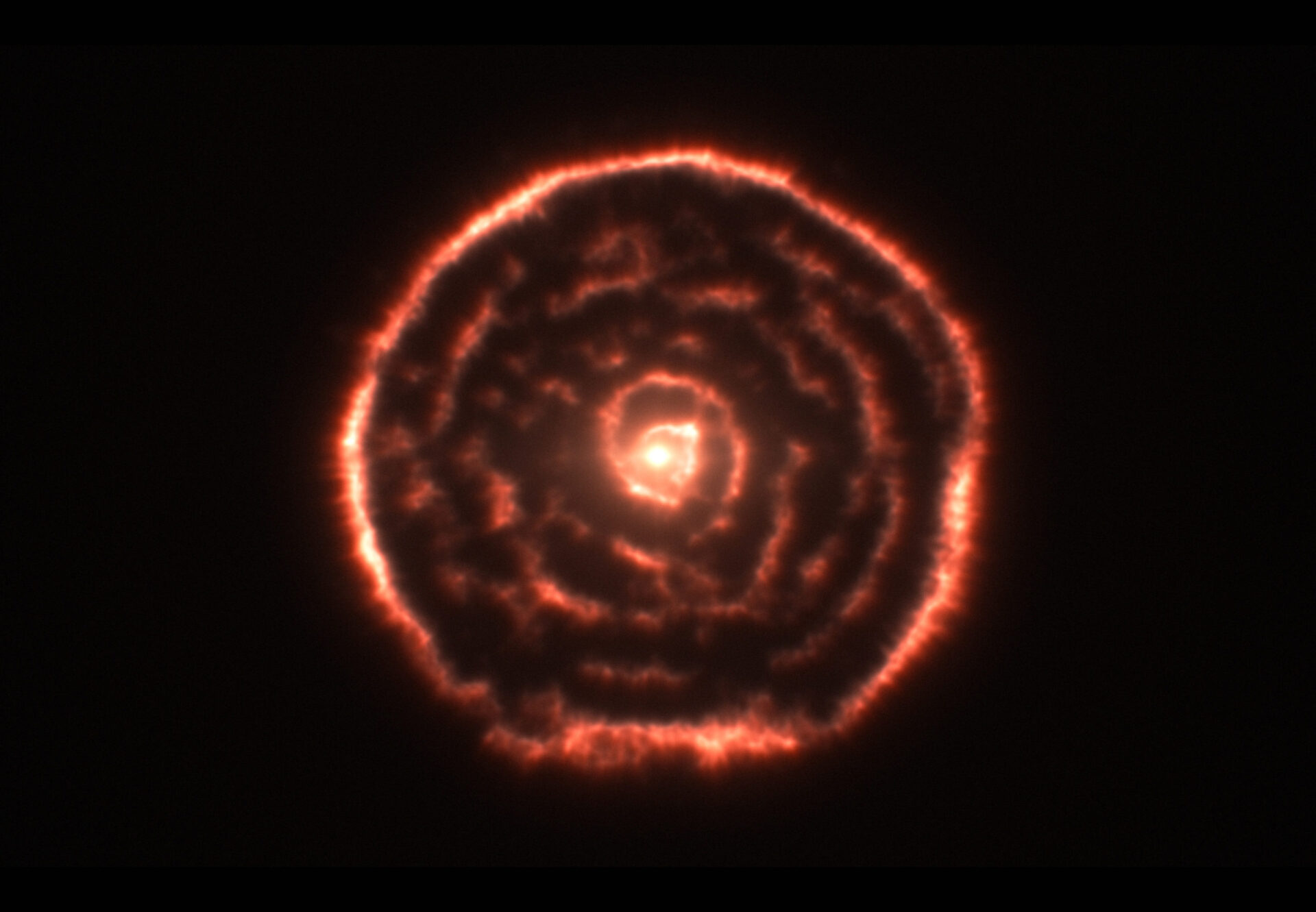 Surprising spiral structure in the gas around the red giant star R Sculptoris
