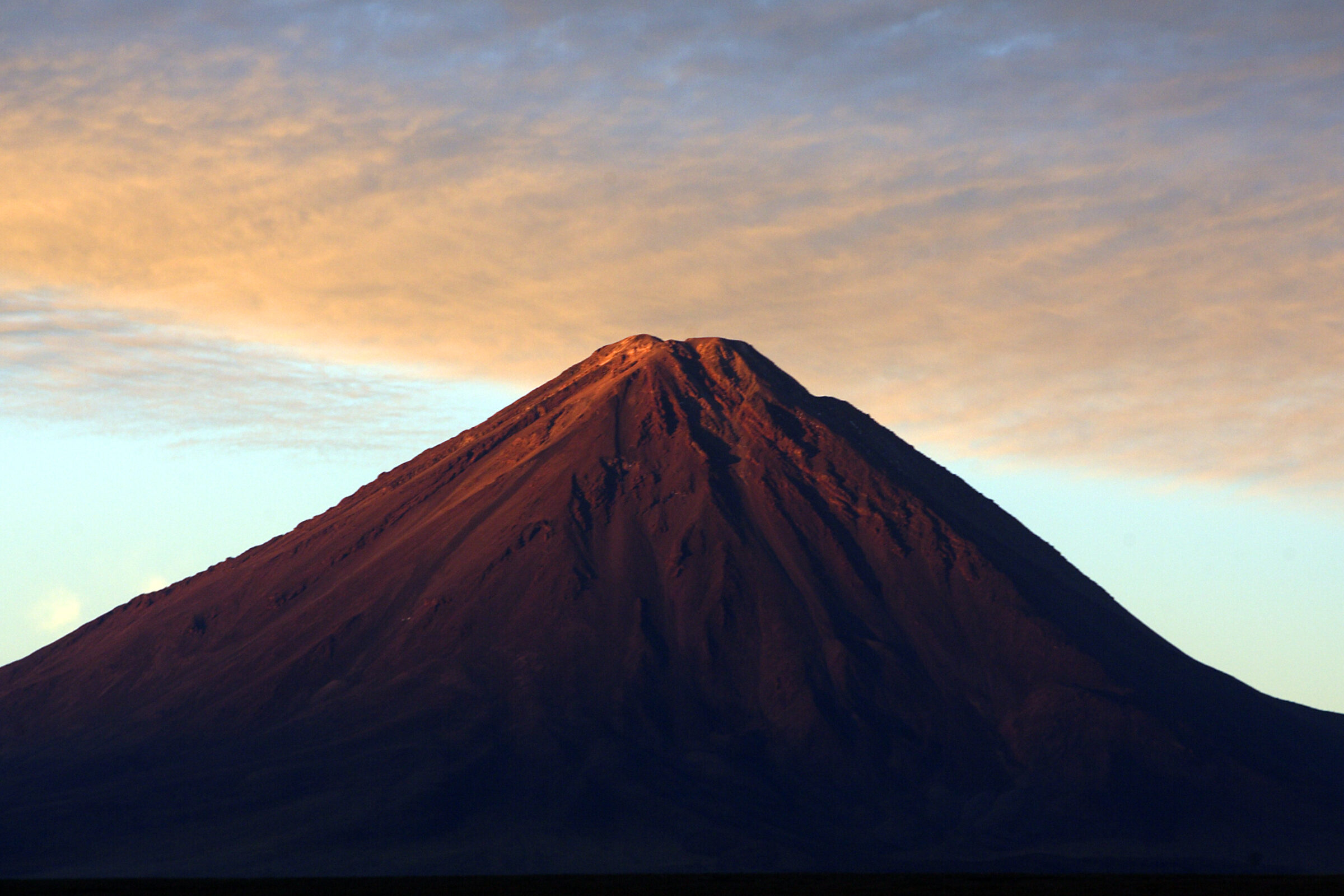 Sunset over the top of the Licancabur volcano