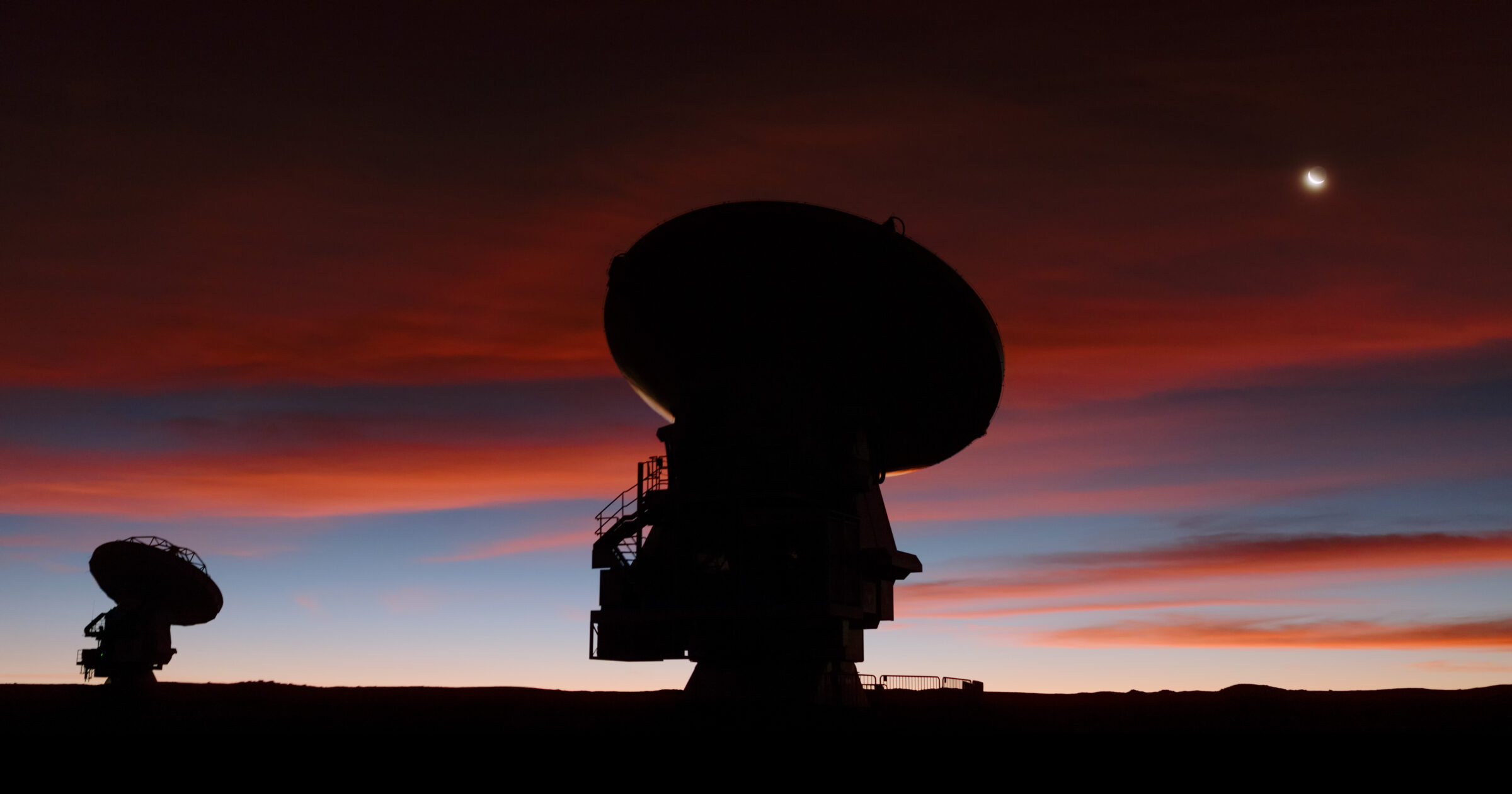 Bright crescent Moon hanging above the Chilean Andes