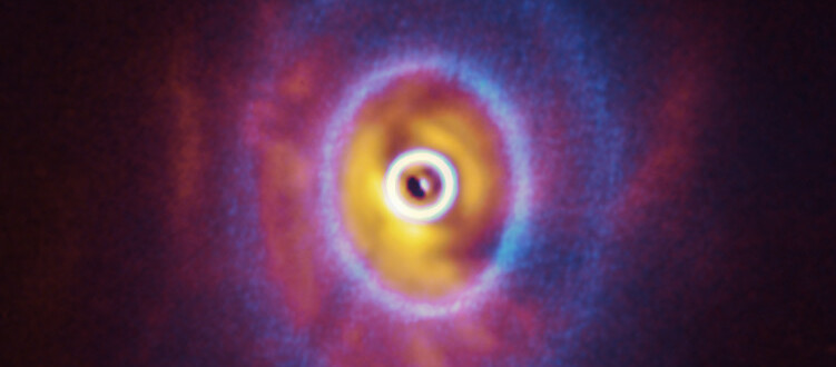 ALMA Discovers Misaligned Rings in Planet-Forming Disk Around Triple Stars