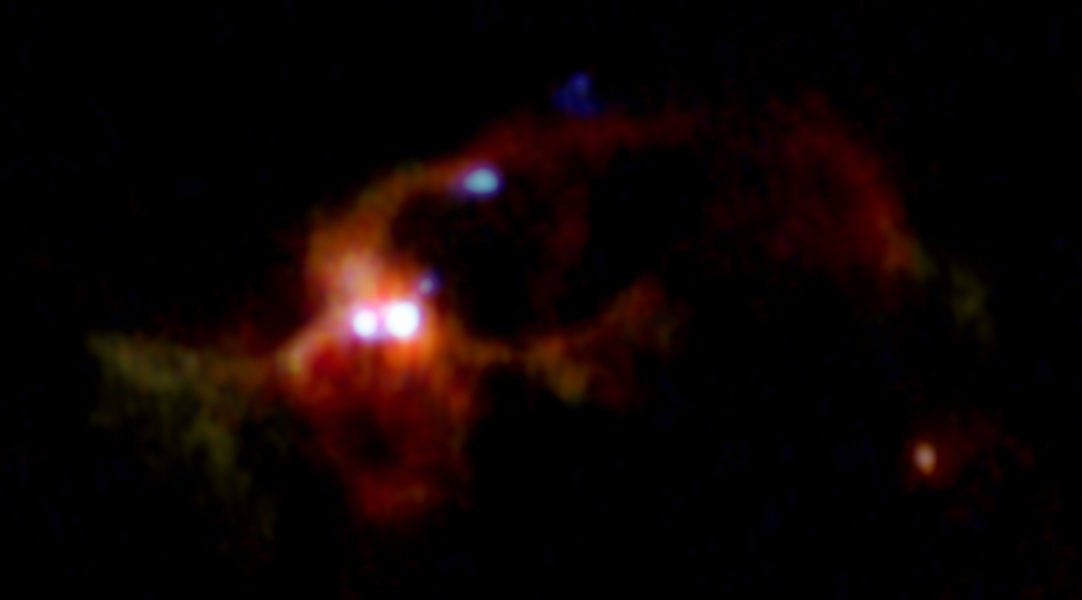 Pair of Massive Baby Stars Swaddled in Salty Water Vapor