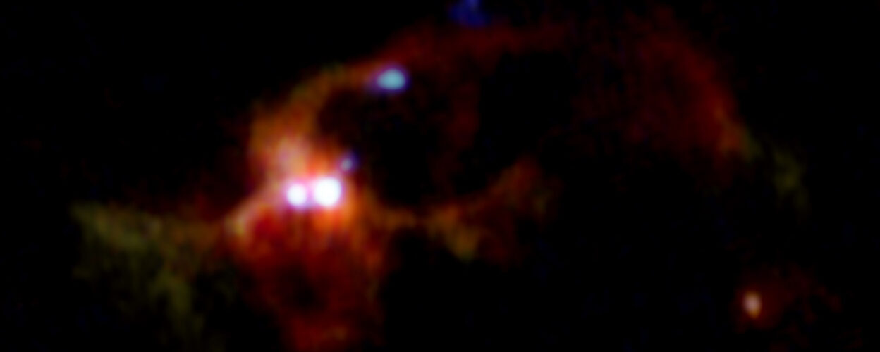 Pair of Massive Baby Stars Swaddled in Salty Water Vapor