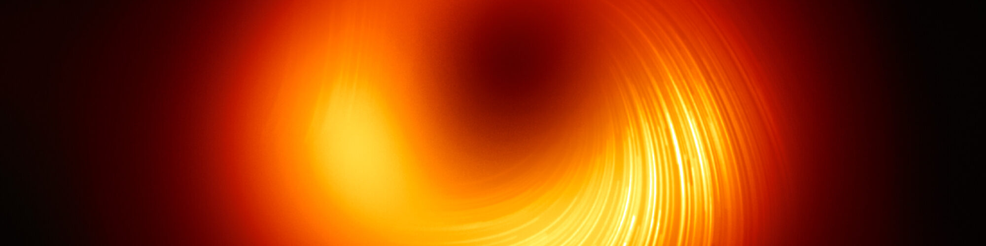 Astronomers image magnetic fields at the edge of M87's black hole