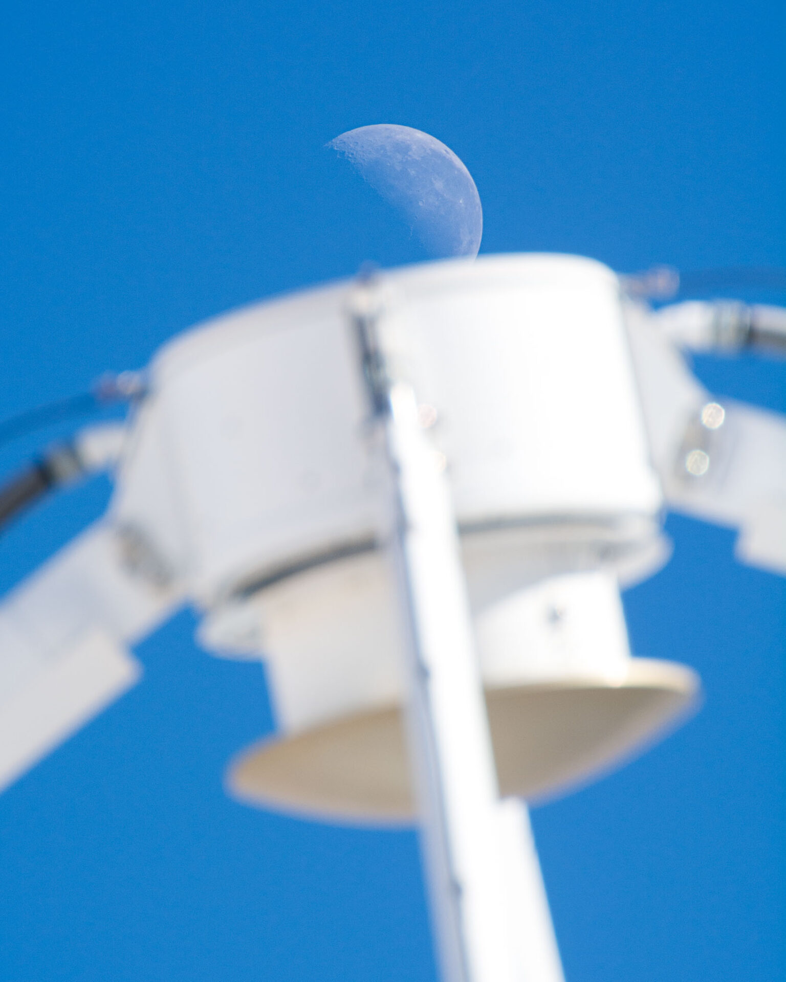 <p>The Moon over the quadrapod and sub-reflector of a 12 meter antenna.</p>
<p>Credit: Sergio Otarola (ESO/NAOJ/NRAO)</p>
