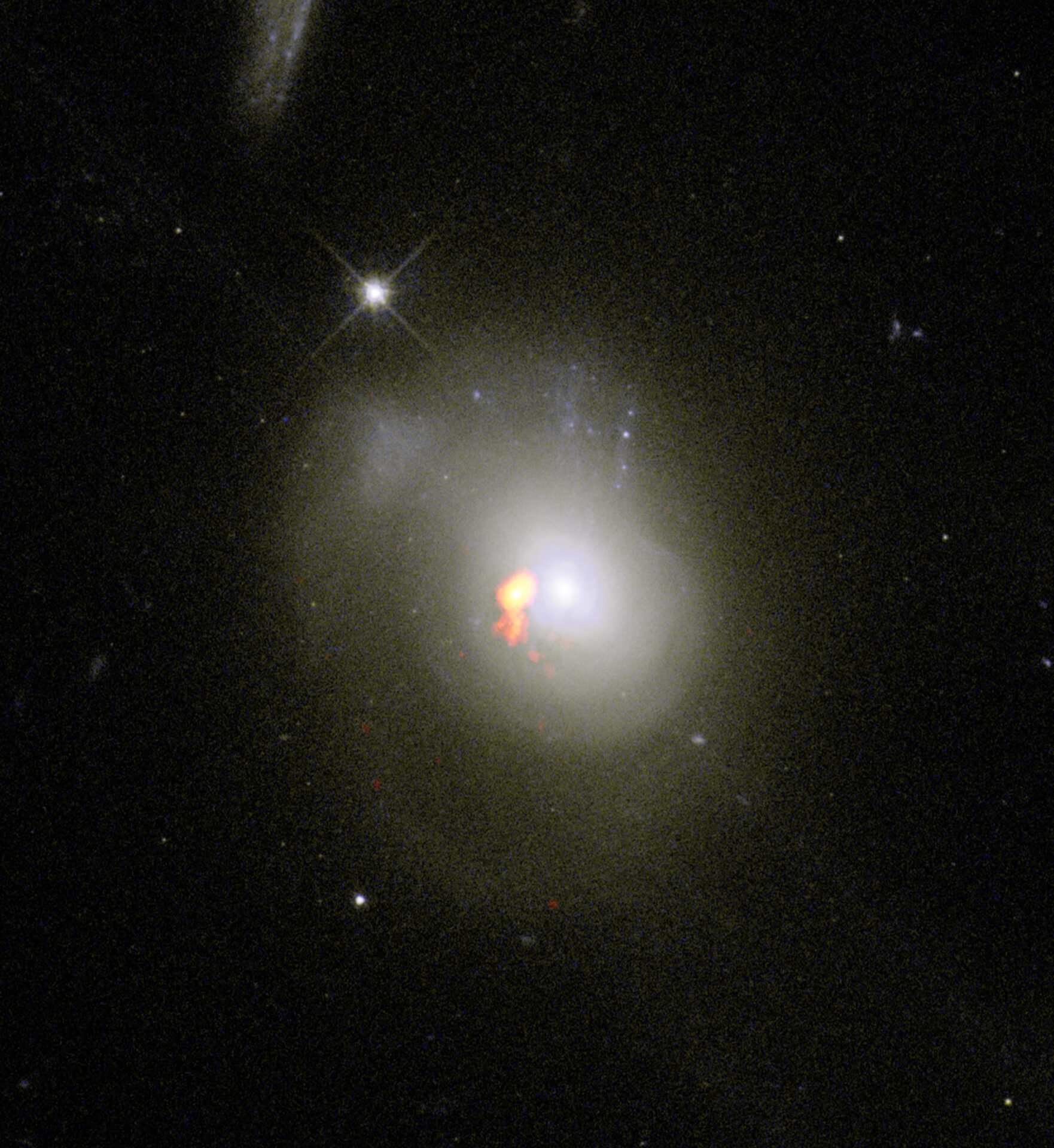 <p>Scientists studying post-starburst galaxies, or PSBs, found that they don't behave as expected. PSBs were previously believed to scatter their gas as they become dormant. New observations have revealed that these galaxies actually hang onto this gas and compact it near to their centers. PSB 0379.579.51789 is the one exception in the study. Here, radio data of the galaxy overlaid on optical images from the Hubble Space Telescope reveal that while the galaxy did hold onto its star-forming fuel, the collection of gas is located off-center. Credit: ALMA (ESO/NAOJ/NRAO) / S. Dagnello (NRAO/AUI/NSF)</p>
