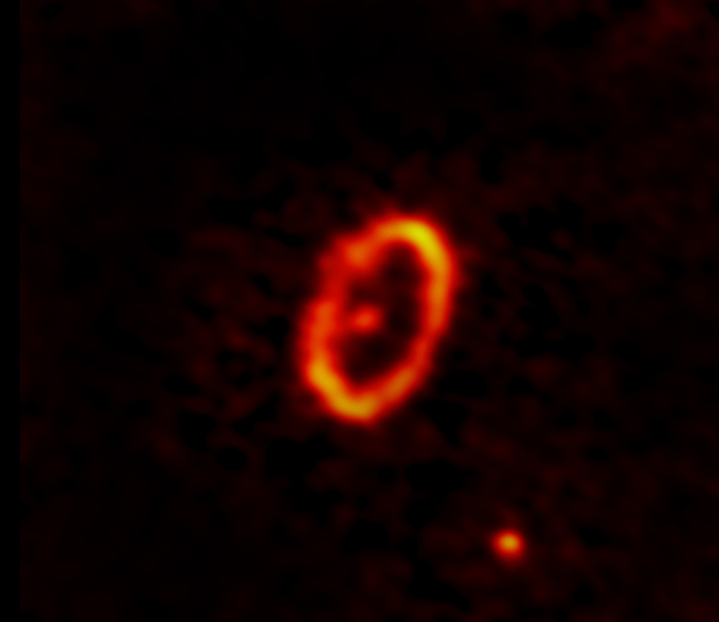 <p>While studying HD 53143— a roughly billion-year-old Sun-like star— in millimeter-wavelengths for the first time, scientists discovered that the star's debris disk is highly eccentric. Unlike ring-shaped debris disks, in which the star sits in the center, HD 53143 is located at one foci of an elliptical-shaped disk and is shown as the unresolved dot below and left of the center. Scientists believe a second unresolved dot in the north of this image to be a planet that is perturbing and shaping the debris disk. Credit: ALMA (ESO/NAOJ/NRAO)/M. MacGregor (U. Colorado Boulder); S. Dagnello (NRAO/AUI/NSF)</p>
