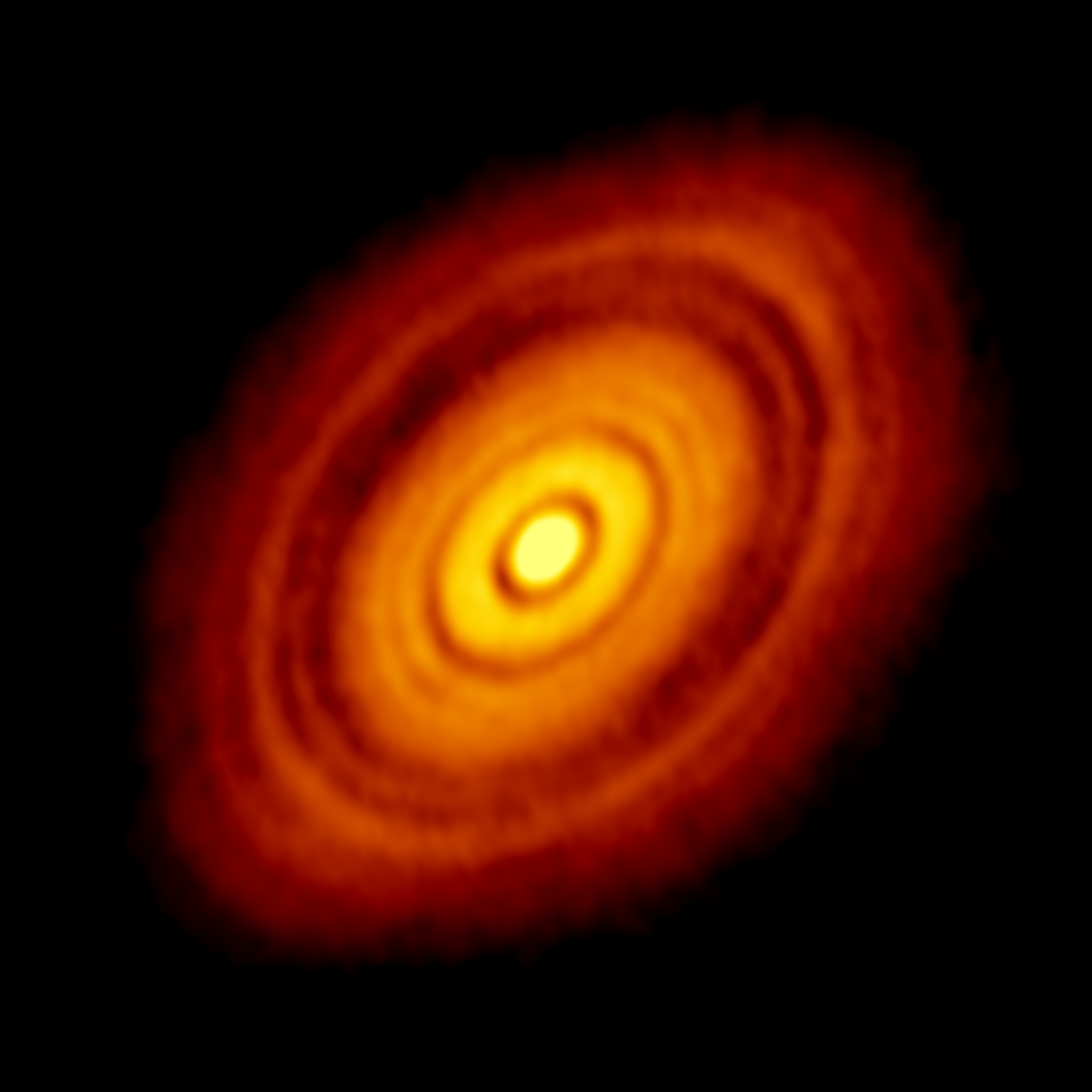 ALMA image of the young star HL Tau and its protoplanetary disk. This best image ever of planet formation reveals multiple rings and gaps that herald the presence of emerging planets as they sweep their orbits clear of dust and gas. Credit: ALMA(ESO/NAOJ/NRAO); C. Brogan, B. Saxton (NRAO/AUI/NSF)