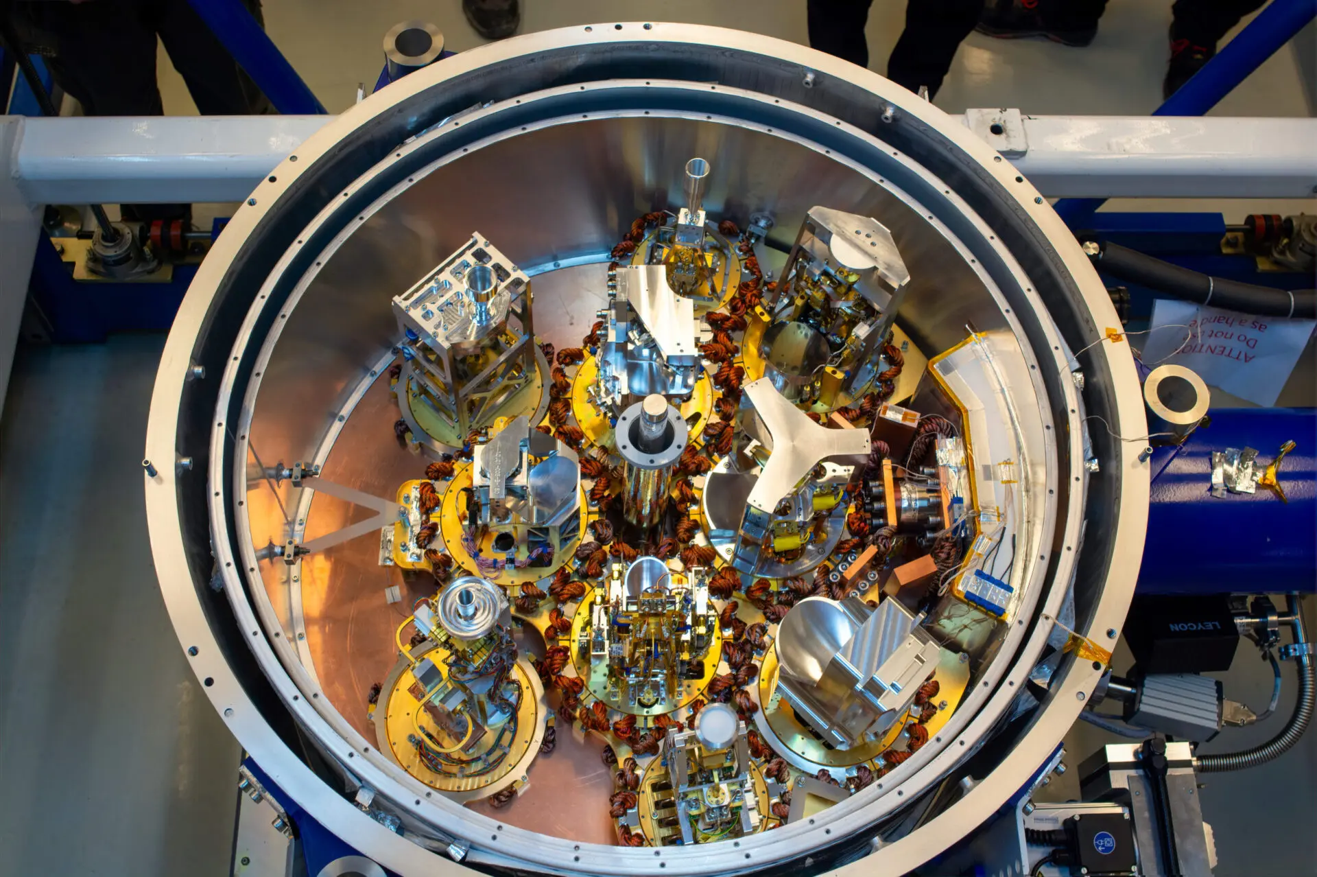 This image shows the cryostat of an Atacama Large Millimeter/submillimeter Array (ALMA) antenna populated with 10 receivers for the first time. The receivers pick up the signals from outer space at specific frequency bands, covering a window from 950 to 35 GHz, and are stored in a cryostat that cools them down to temperatures as low as -269°C. The installation of the "Band 2" receivers, initiated in 2023, means ALMA antennas can observe within the final frequency range (67 to 116 GHs) for which the array was designed. Credit: S. Otarola - ALMA (ESO/NAOJ/NRAO)