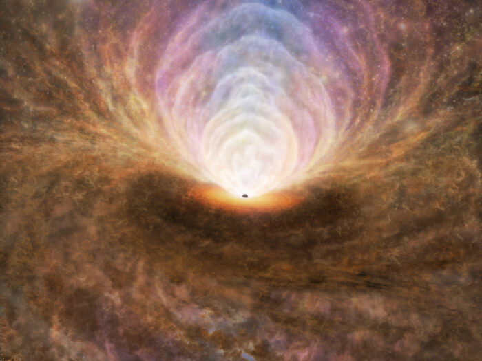 An illustration depicting the distribution of interstellar medium in the active galactic nucleus based on the results of this observation. High-density molecular gas flows from the galaxy towards the black hole along the plane of the disk. The material accumulated around the black hole generates a tremendous amount of energy, causing the molecular gas to be destroyed and transformed into atomic and plasma phases. Most of these multiphase gases are expelled away via outflows from the nucleus (including plasma outflows primarily occurring in the direction above the disk and atomic or molecular outflows mainly occurring diagonally). Still, most of these outflows will fall back to the disk, acting like a gas fountain. Credit: ALMA (ESO/NAOJ/NRAO), T. Izumi et al.