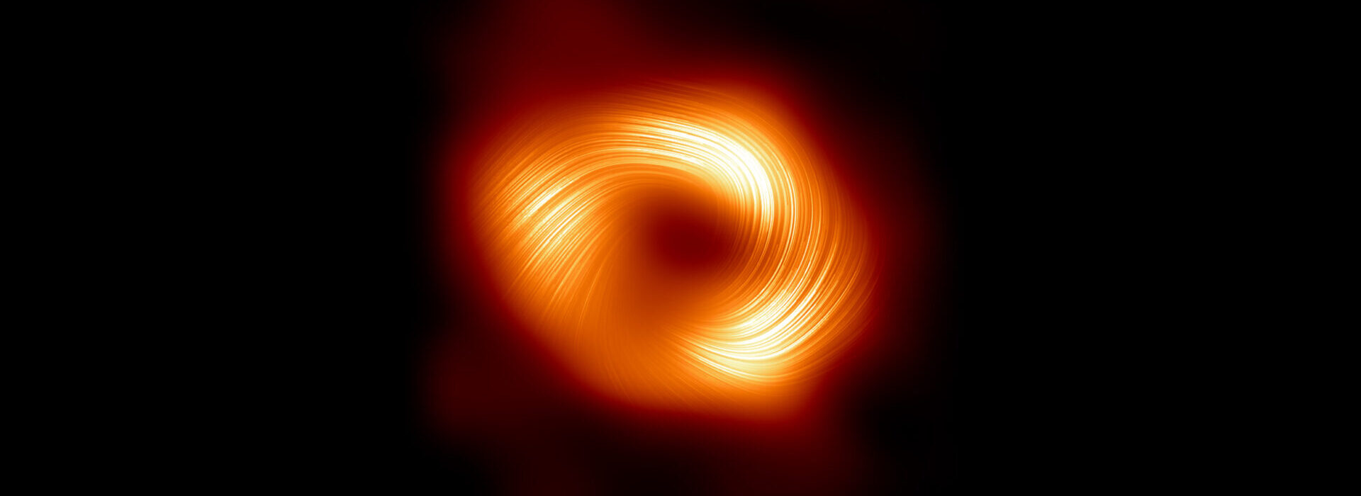 Astronomers unveil strong magnetic fields spiraling at the edge of Milky Way’s central black hole